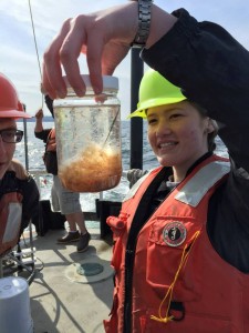 Examining zooplankton samples on the R/V Barnes with student Alex Mitchell-Morton.
