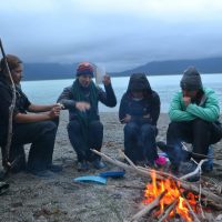 One of many deep conversations around a fire, here some 30 miles of paddling into the wilderness of Sit’ Eeti Geeyi, the Huna Tlingit homeland in Glacier Bay National Park. During the course, each student took turns leading a discussion on a topic of their choosing, relating to course themes.